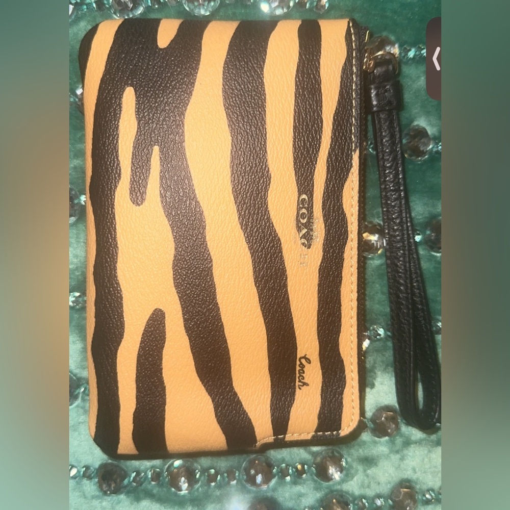 Coach Animal Print Wristlet in Black and Tan